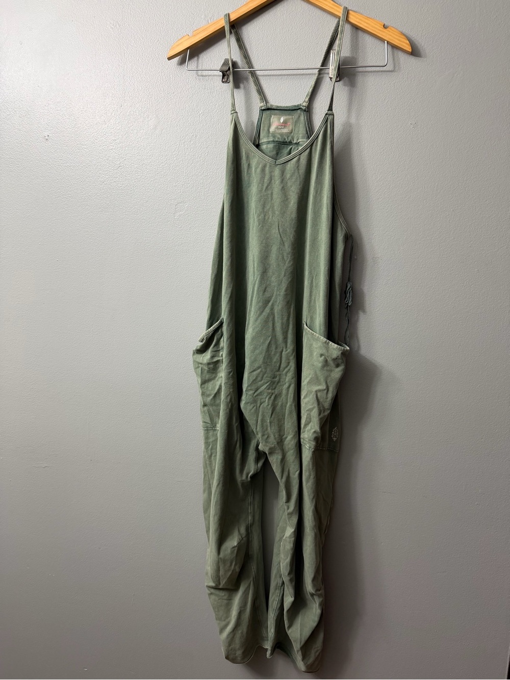 FP Movement Hot Shot Onesie in an olive green shade small